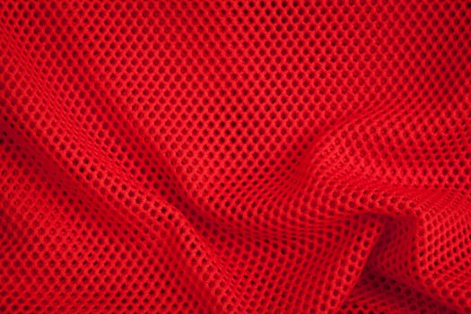 Red fishnet texture and background close-up