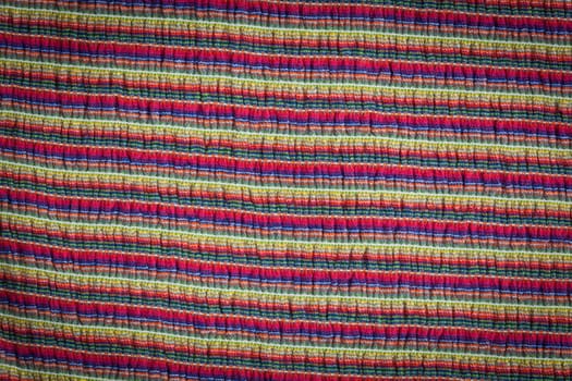 Multi colored striped texture and background close-up