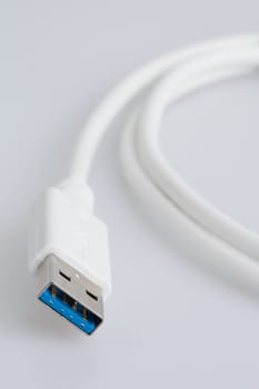 White USB Cable on a white backrgound