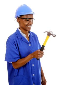 Happy smiling African ethnic lady with hammer and protective safety glasses and hat
