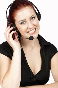 Professional woman talking on a headset in her office at work. With white background