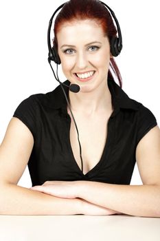 Professional woman talking on a headset in her office at work. With white background