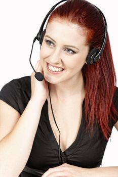 Professional woman talking on a headset in her office at work. With white background