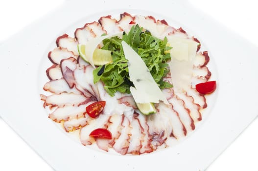 Octopus carpaccio with herbs and cheese