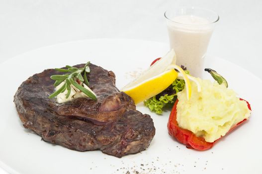 beef steak with vegetables and sauce