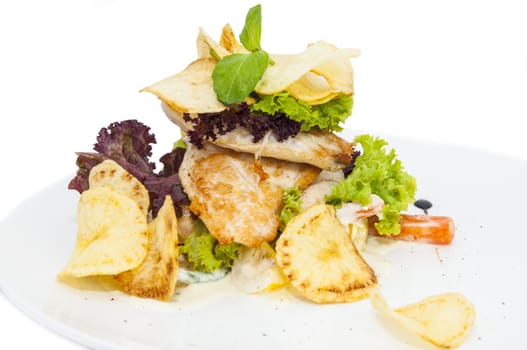 chicken salad and chips on a white background