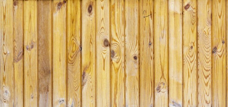 Close up of gray wooden fence panels 