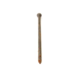 One metal nail isolated on a white background 