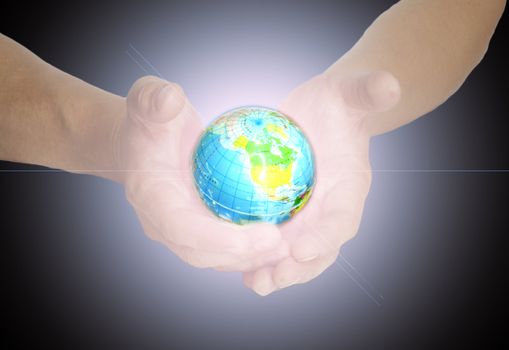 Man holding a glowing earth globe in his hands 