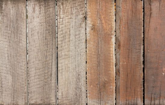 Close up of gray wooden fence panels 