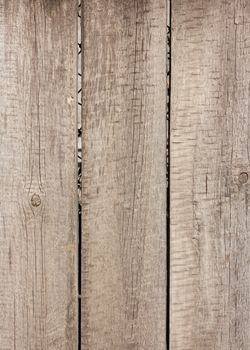 Close up of gray wooden fence panels 