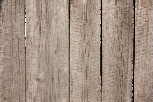 Close up of gray wooden fence panels 