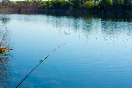 fishing in a calm swedish lake on a sunny day 