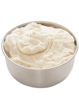 close up of a bowl of flour dough