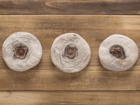 close up of dried persimmons on table