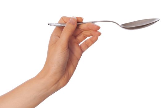 woman holding tablespoon in the hand for feeding a sick person
