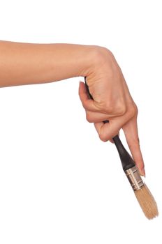 woman drawing a wall with a brush