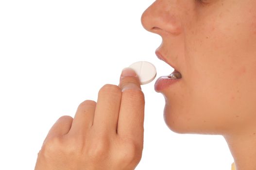 woman taking narcotic in a shape of white pill