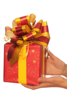woman giving a red box with yellow bow as a gift