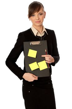 The office worker working in office and holding the document case with stickers in the hands