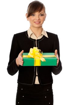 Woman holding a green box with yellow bow as a present