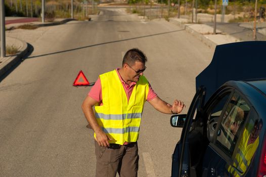 Guy really fed up with his broken down clunker