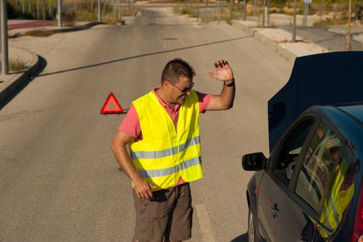 Guy really fed up with his broken down clunker