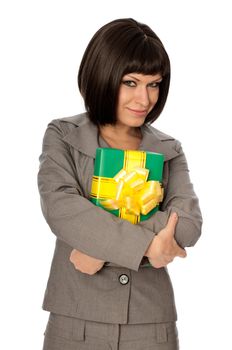 Woman holding a green box with yellow bow as a present