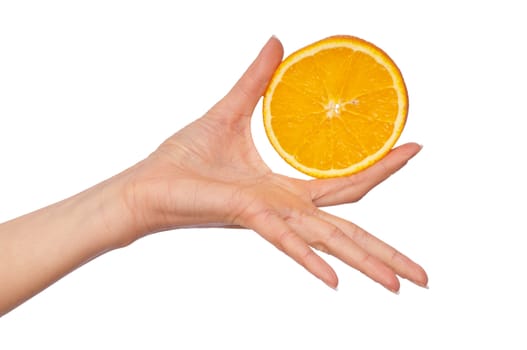 Slice of a fresh Sicilian orange in the hand