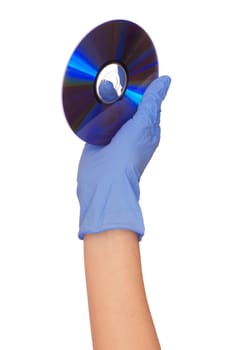 inspector in blue gloves holds in a hand confidential audio and video about hacker programs and viruses