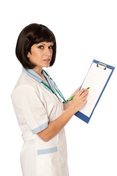 The doctor holding clipboard with blank paper in the hand