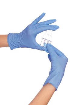 laboratory assistant takes three ampules for making a vaccination