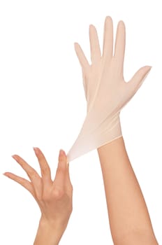 Doctor putting on white sterilized medical glove for making operation