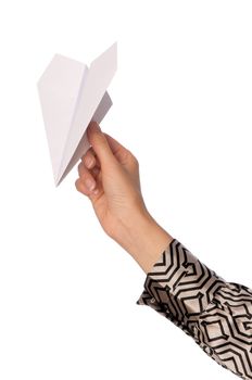 Businesswoman throwing white paper plane on the break