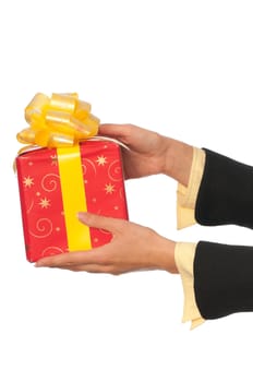 woman giving a red box with yellow bow as a gift