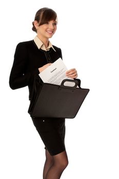 Businesswoman taking out from a suitcase contract for new employees