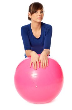 instructor showing exercises using fitball at gym to people