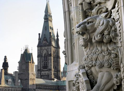 A gargoyle lion welcomes you to the canadian Parliament buildings entrance in Ottawa, Canada.