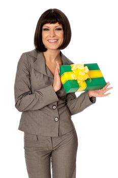 Woman holding a green box with yellow bow as a present