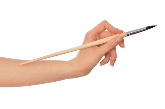 woman drawing a picture with a brush