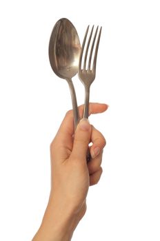 woman holding spoon and fork in the hand to tableware the dinner