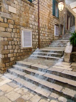 Rain water going down street stairs, Old town of Dubrovnik, Croatia