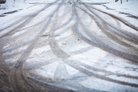 Snow-covered road, the marks of wheels