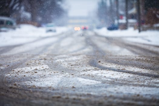 Snow-covered road, the marks of wheels