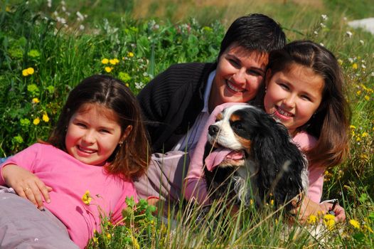 mother, twins sisters and little dog cavalier king charles
