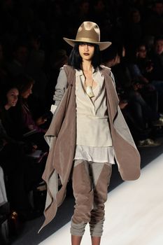 NEW YORK - FEBRUARY 09: Model walks the runway for the Nicholas K collections Mercedes-Benz Fashion Week at Lincoln Centre on February 09, 2012 in New York.