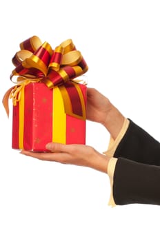 woman giving a red box with yellow bow as a gift