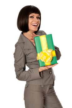 Woman holding a green box with yellow bow as a present