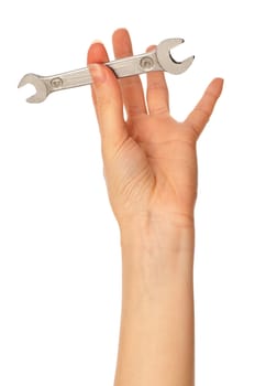 woman holding chrome vanadium spanner in the hand