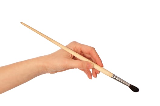 woman drawing a picture with a brush